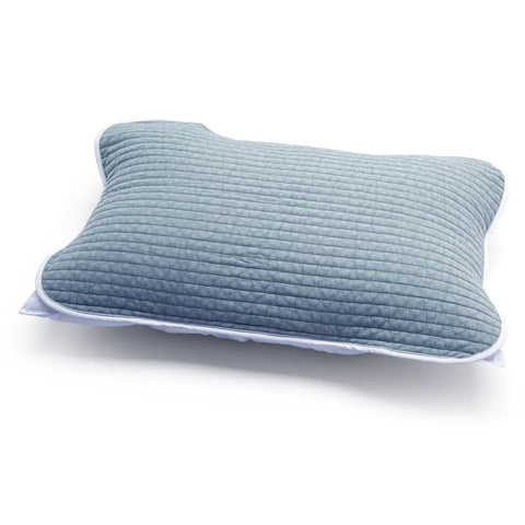 Blue quilted pillow on a white background