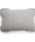 Gray textured pillow on a white background