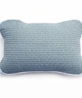 Blue textured pillow on a white background