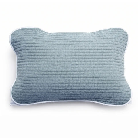 Blue textured pillow on a white background
