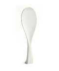 White textured spoon on a white background