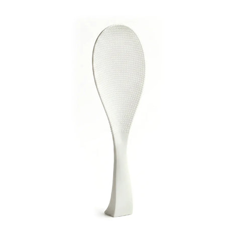 White textured spoon on a white background
