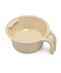 Beige plastic spoon holder cup with handle on a white background
