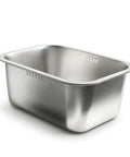 Stainless steel dish tub on a white background