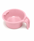 A light pink plastic measuring cup with a handle, shown on a clean white background.
