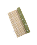 A bamboo sushi rolling mat with a natural light tan surface, green bamboo strips along the rolled edge, and white string ties, shown on a plain white background.