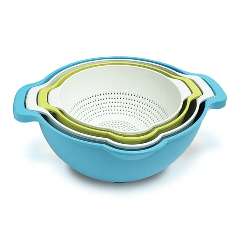Set of three nesting colanders in blue, green, and white on a white background