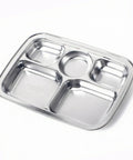 Stainless steel divided tray on a white background