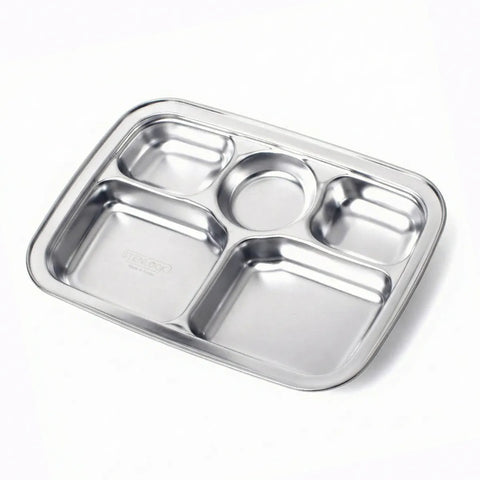 Stainless steel divided tray on a white background