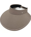 Beige visor hat with black band on a white background