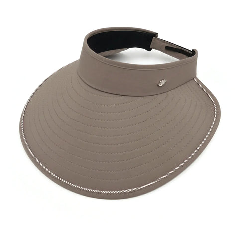 Beige visor hat with black band on a white background
