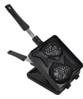 Black fish-shaped waffle maker on a white background