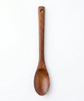 Wooden spoon on a white background