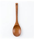 Wooden spoon on a white background