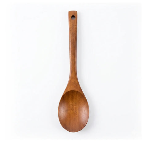Wooden spoon on a white background