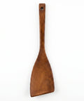 Wooden spatula on a white background