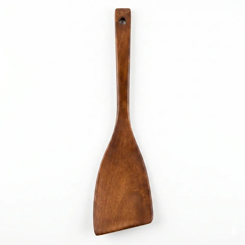 Wooden spatula on a white background