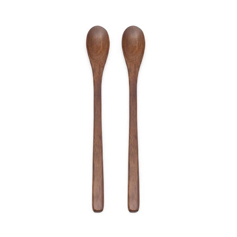 Two wooden spoons on a white background