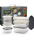 Set of food storage containers with a branded box in the background