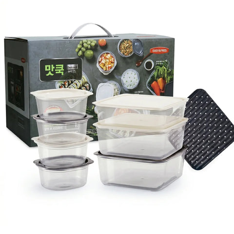 Set of food storage containers with a branded box in the background