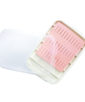Pink and white food storage prep container on a white background
