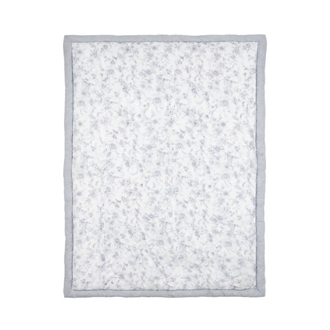 Floral-patterned blanket with a gray border on a white background