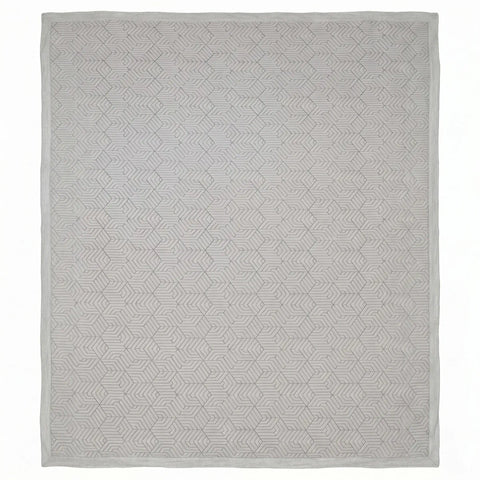 Gray geometric patterned mattress pad on a white background
