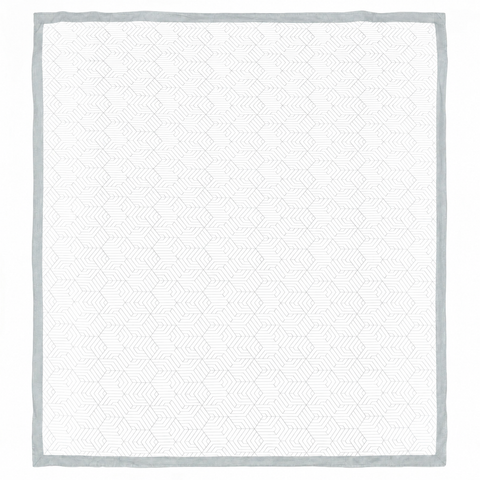 White mattress pad with gray border on a white background