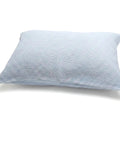 Light blue textured pillow on a white background