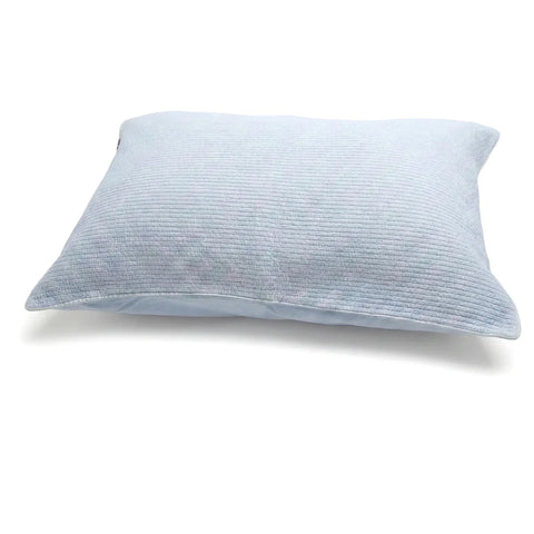 Light blue textured pillow on a white background