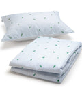 A bedding set featuring a light blue and white striped pillowcase and matching comforter, both decorated with a small green leaf pattern, shown on a white background.