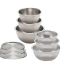 Set of stainless steel mixing bowls and sieves on a white background