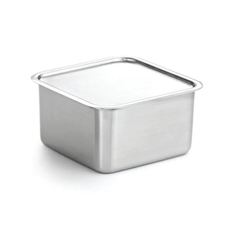 Stainless steel container with lid on a white background