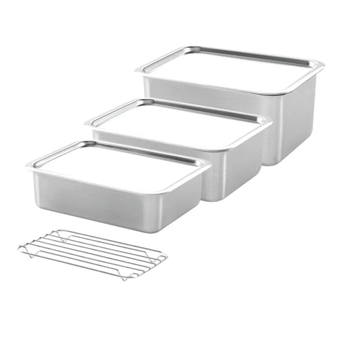 Set of stainless steel kitchen containers with a wire rack on a white background
