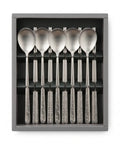 Set of six silver spoons and chopsticks in a gray box
