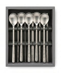 Set of six silver spoons and chopsticks in a gray box