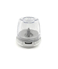 Clear and white kitchen grinder on a white background