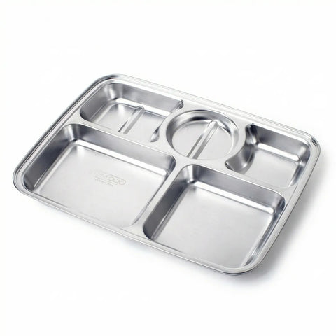 Stainless steel divided tray on a white background