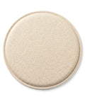 Round beige cushion on a white background