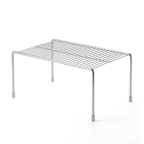 Metal wire shelf on a white background