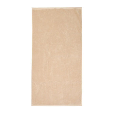 Beige towel on a white background