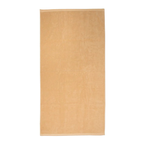 Gold towel on a white background