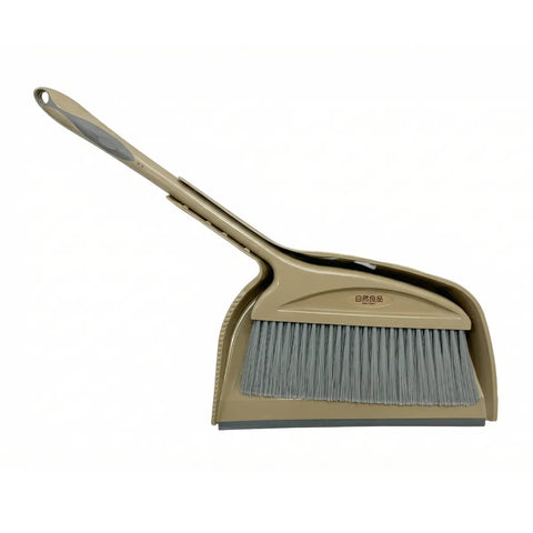 Beige broom and dustpan set on a white background