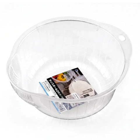 A clear plastic bowl with a molded handle and a small printed product insert card inside, photographed on a clean white background.