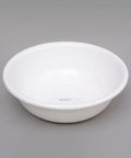 A white ceramic washbasin bowl with a small 'bianca' brand mark printed inside, shown on a neutral gray background.