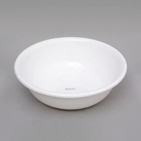 A white ceramic washbasin bowl with a small 'bianca' brand mark printed inside, shown on a neutral gray background.