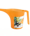 An orange plastic watering can with a spout and handle, featuring a Japanese label on the front, set against a plain white background.
