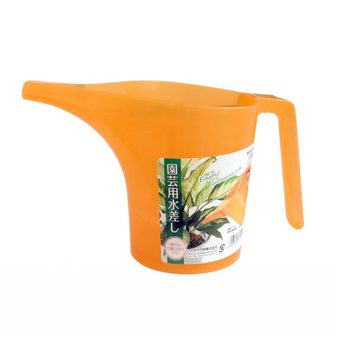 An orange plastic watering can with a spout and handle, featuring a Japanese label on the front, set against a plain white background.
