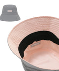 Gray bucket hat with a visible brand label on a white background