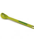 Green slotted ladle spoon on a white background